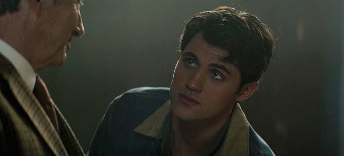 Drake Rodger giving dreamy eyes look to Jack Wilcox on The Winchesters.