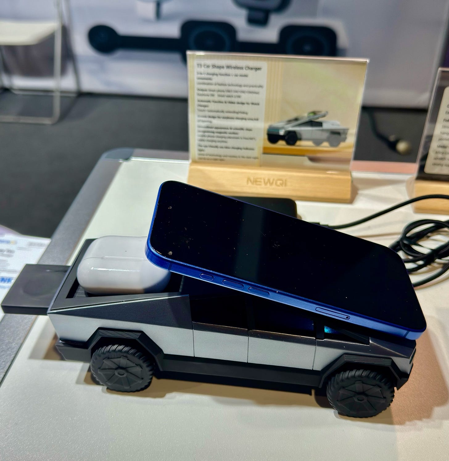 A cell phone on a toy car

Description automatically generated