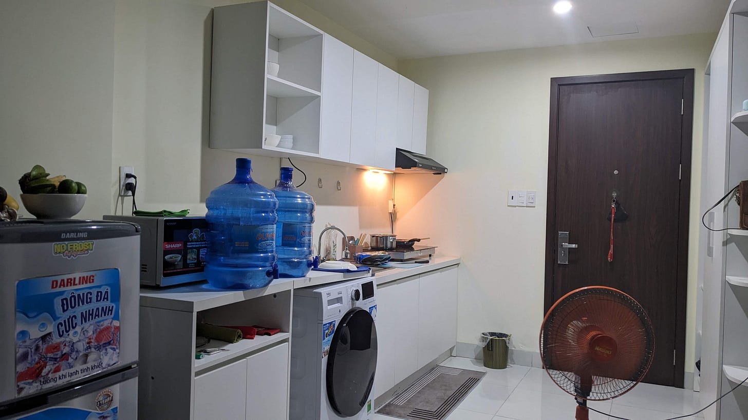 kitchen scene with 2 giant water jugs