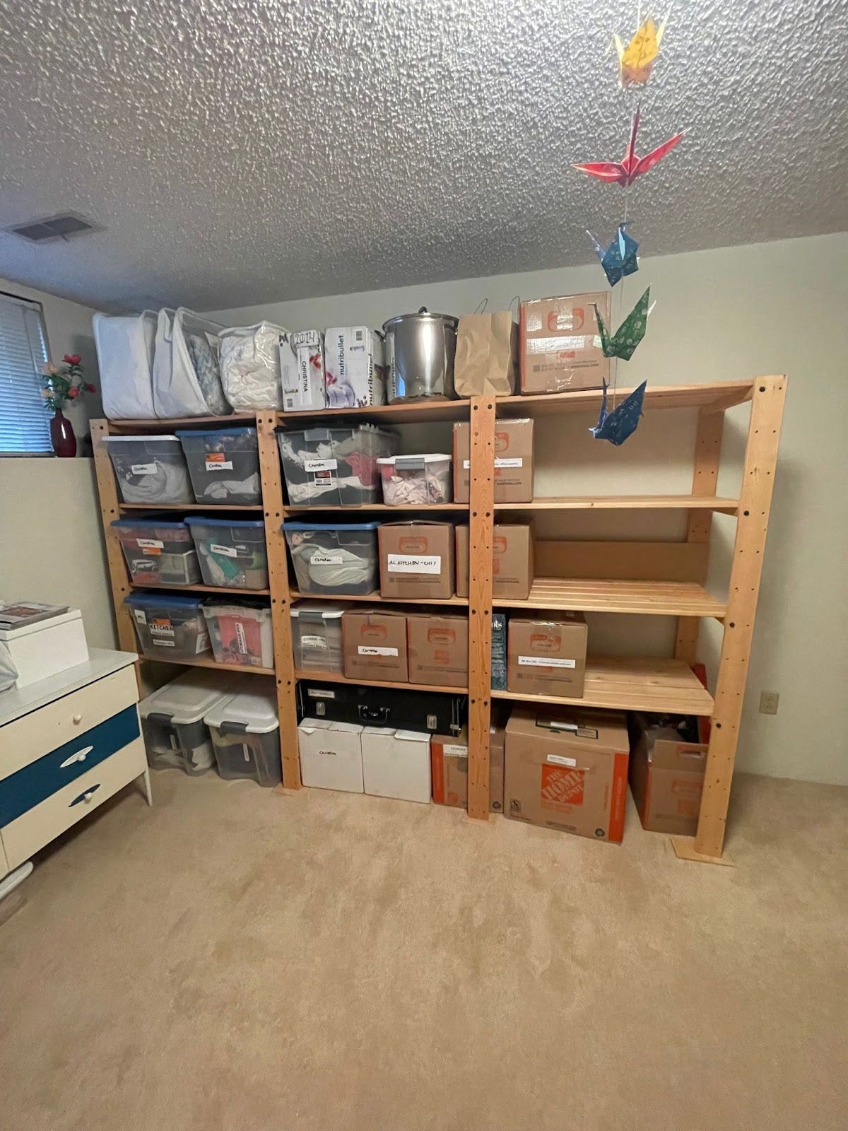 Photo of a shelf with our older daughter's stuff