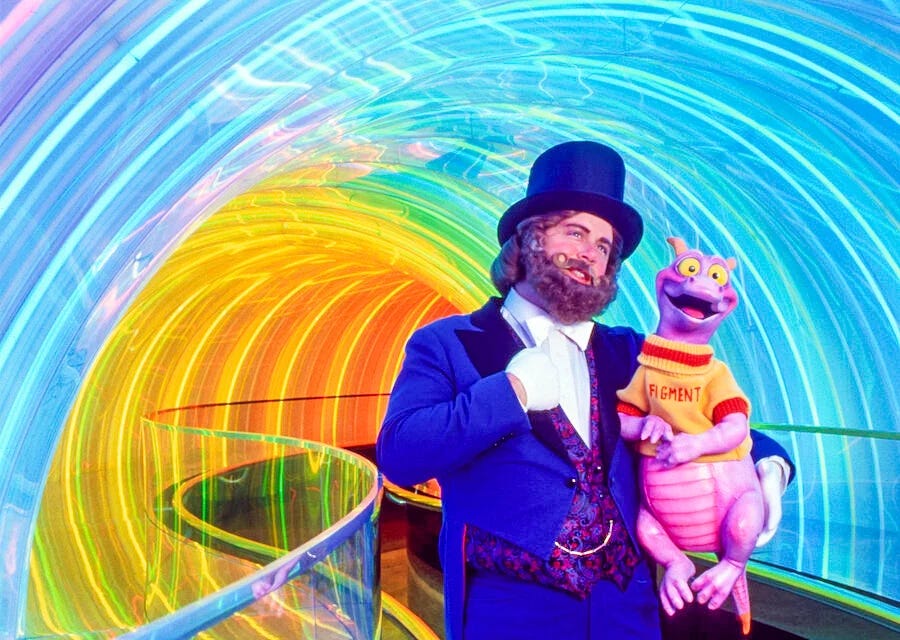 the dreamfinder and figment in the rainbow corridor in the imagination pavilion at epcot center