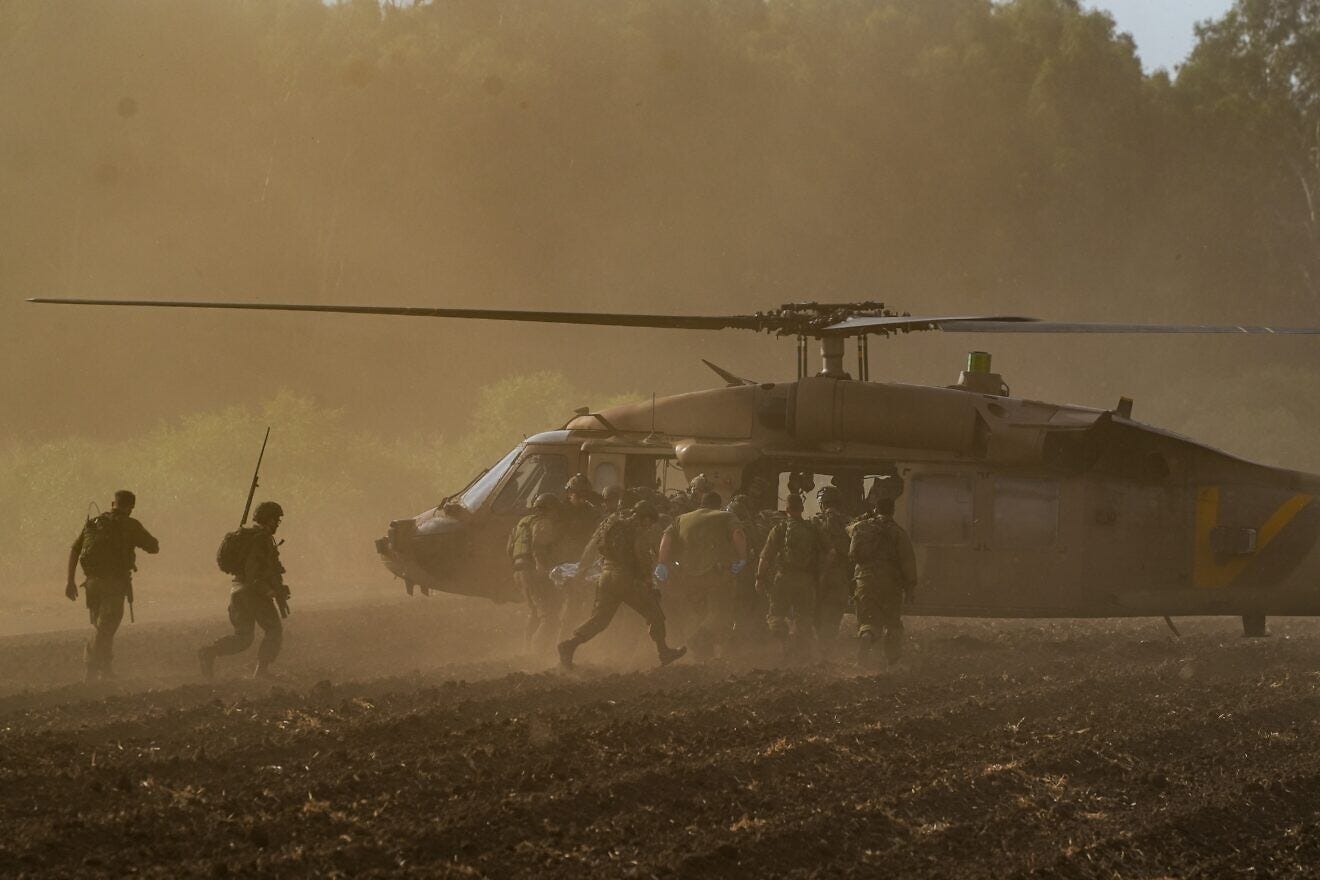 Israeli soldiers evacuate wounded people who was severely injured when a missile fired from Lebanon hit the Ramim Cliff area, near the Israeli border with Lebanon, on Sept. 19, 2024. Photo by Ayal Margolin/Flash90.