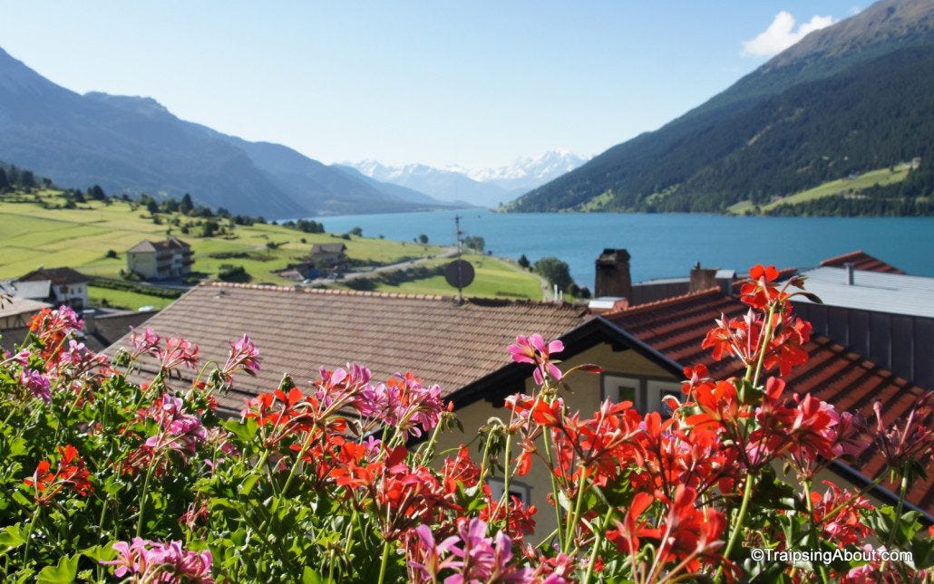 Enjoying the view from a balcony in Resia, Italy.