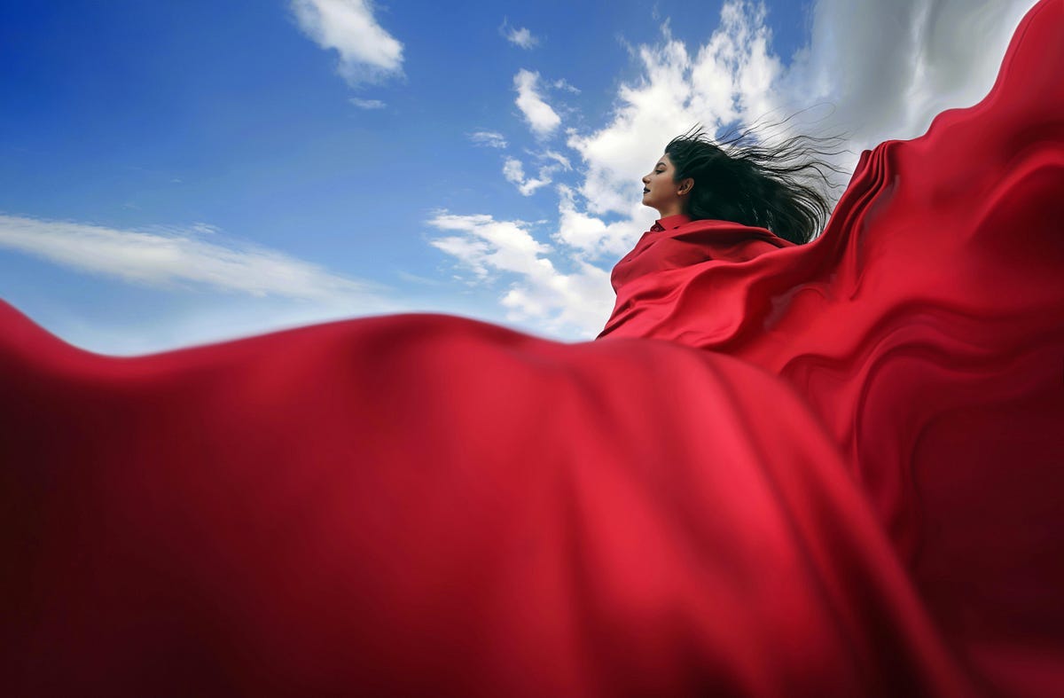 Woman in red cloak Woman in red cloak