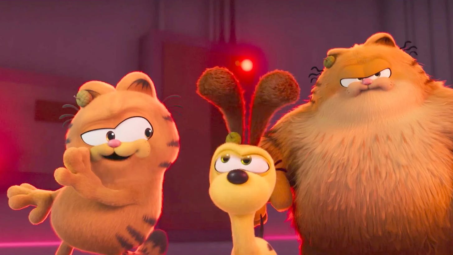 Garfield (Chris Pratt), Odie, and Vic (Samuel L. Jackson) in The Garfield Movie