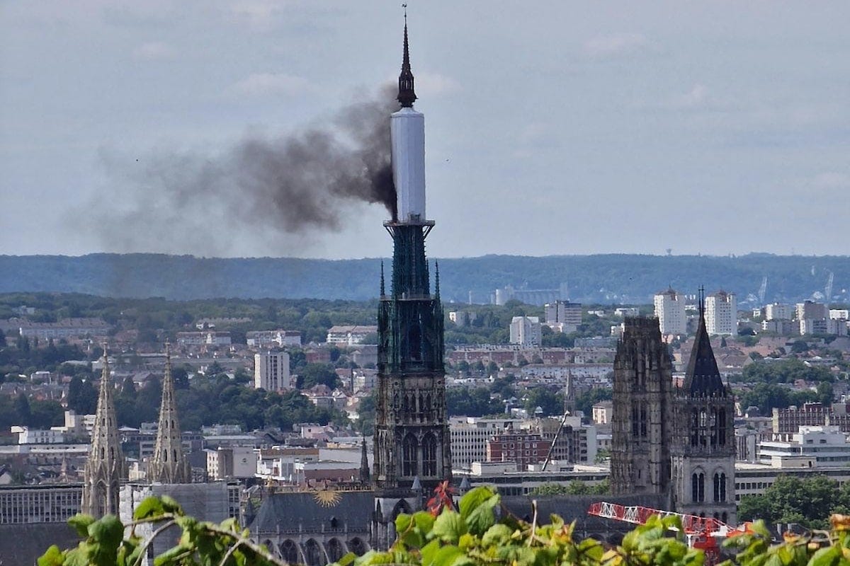 Rouen cathedral spire in northern France catches fire, firefighters ...