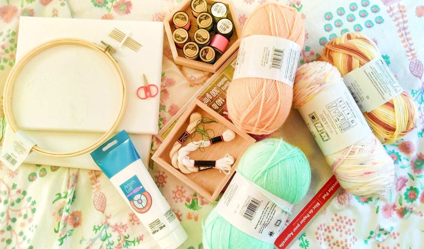 Art supplies: embrodery thread,hoop, crochet yarn, blank canvases, watercolor paper, needles, small scissors and frames