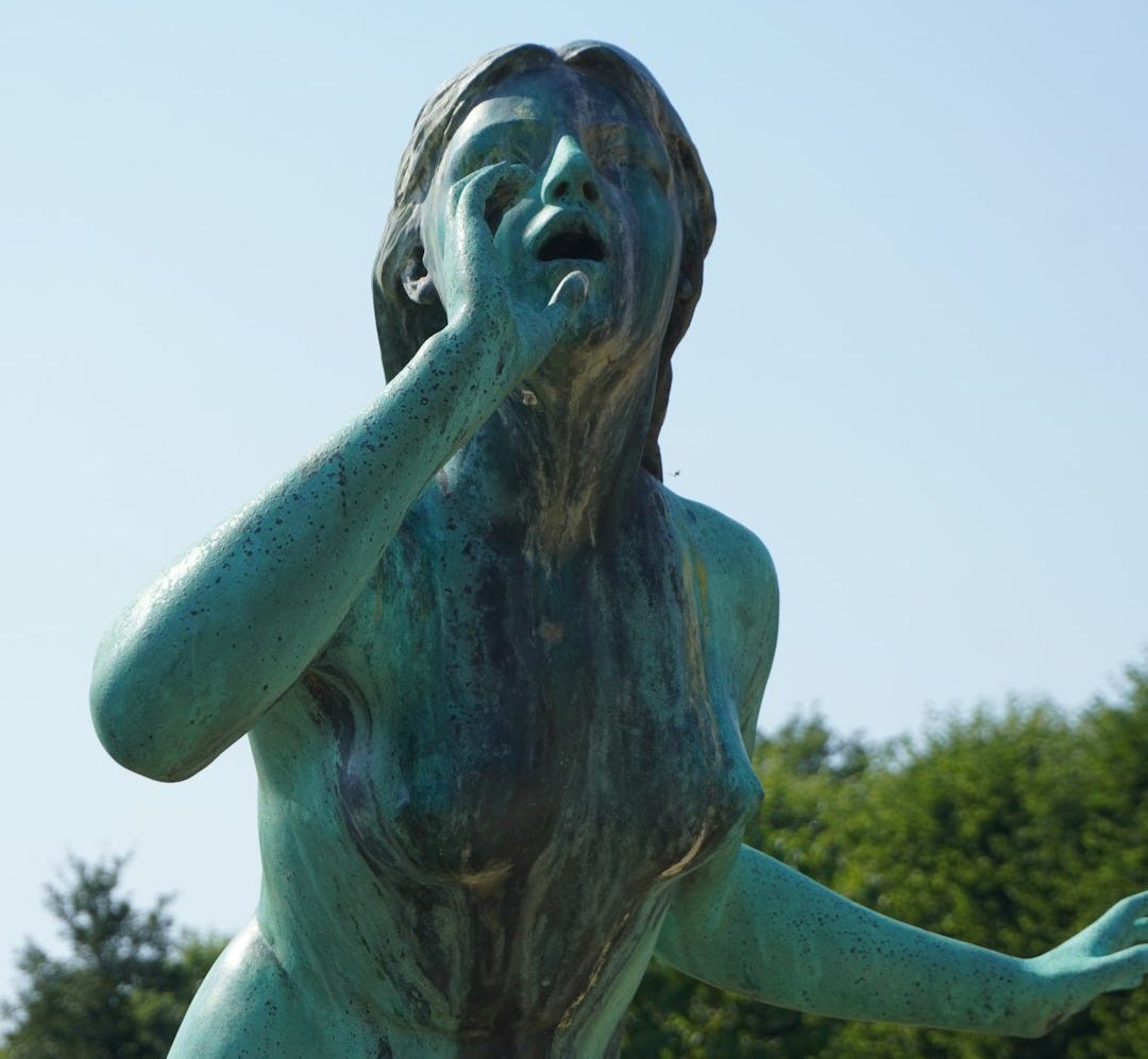 a statue of a person a statue of a person