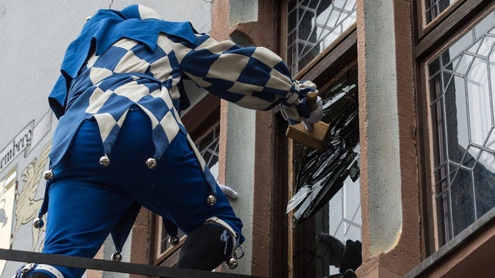 Fasnacht Narr (jester) breaking into city hall