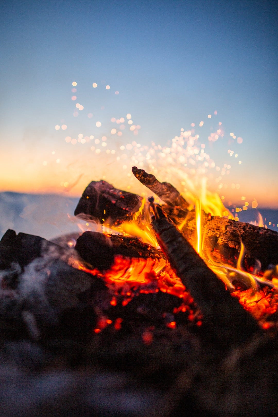 lit bonfire in closeup photography