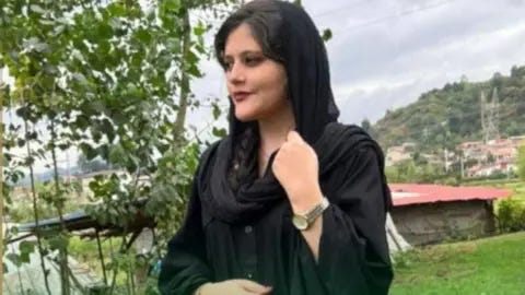 Mahsa Amini family Mahsa Amini was 22 when she died in police custody after being arrested by Iran's morality police for not wearing the hijab properly