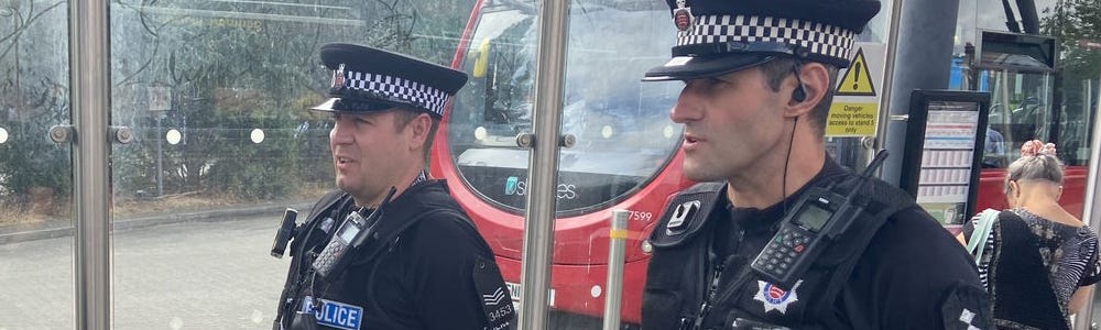 Sergeant Graham Thomas of Chelmsford CPT and Chief Inspector Leigh Norris of the Positive Action team patrol Chelmsford bus station.