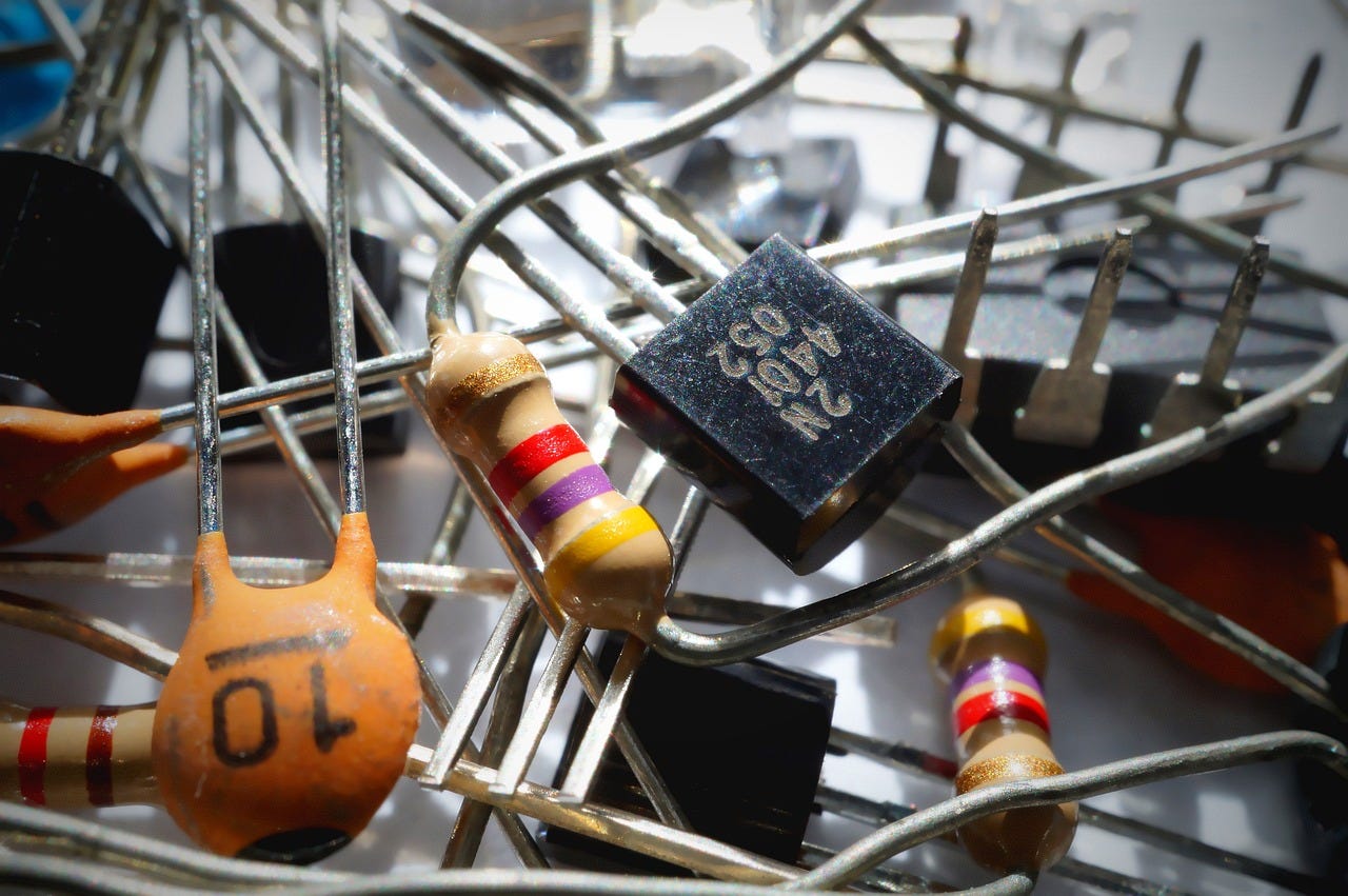 Image of a pile of transistors and capacitors.