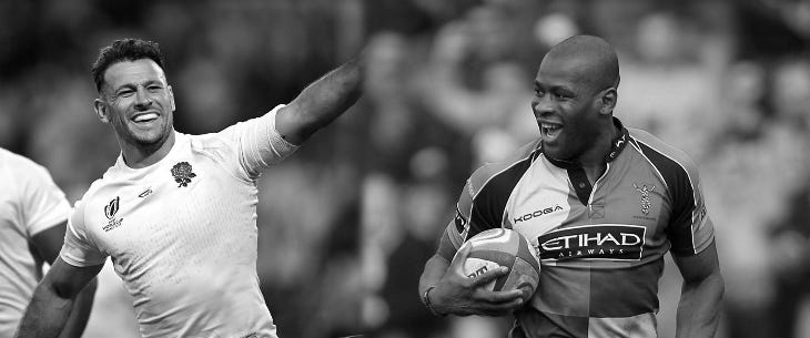 A black and white photo of rugby players Danny Care and Ugo Monye 