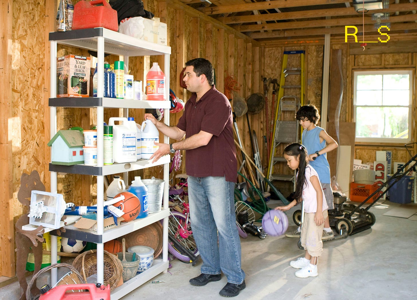 A family organizing their emergency preparedness supplies, demonstrating what a prepper does.