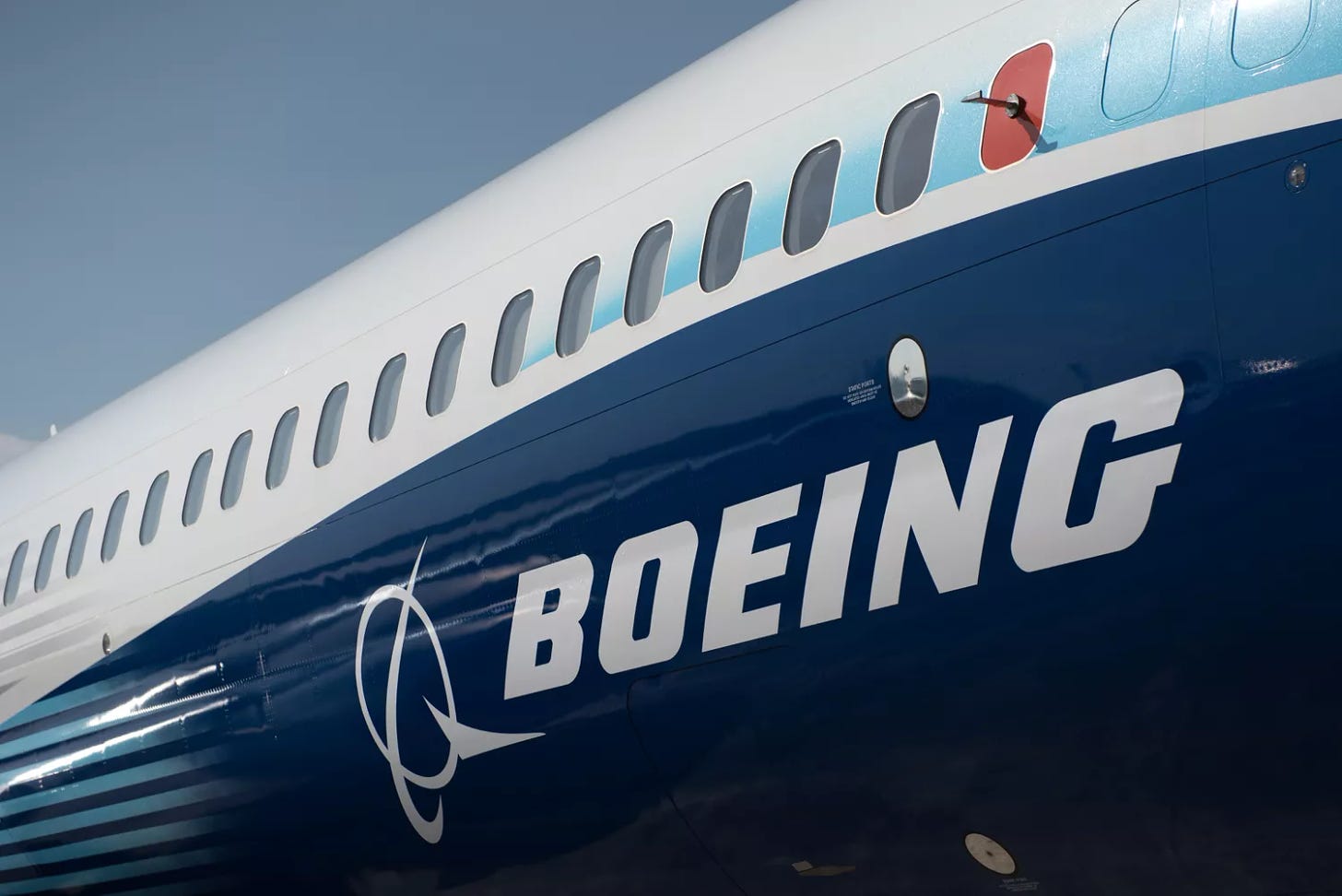 The Boeing logo is seen on the side of a Boeing 737 MAX.