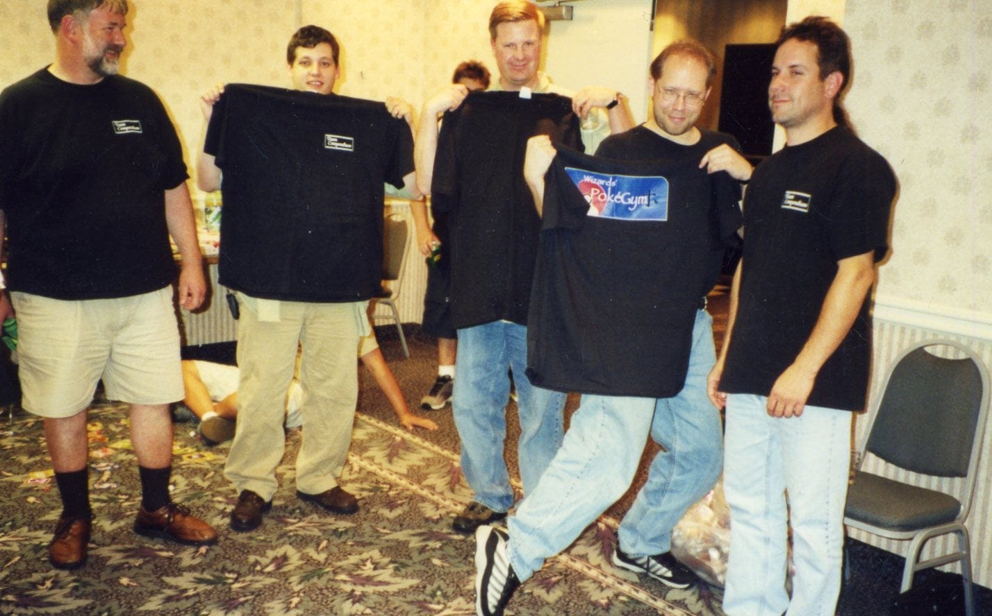 Team Compendium giving Team Compendium/PokeGym shirts to the Wizards of the Coast Pokemon managers at the 2001 East Coast Super Trainer Showdown