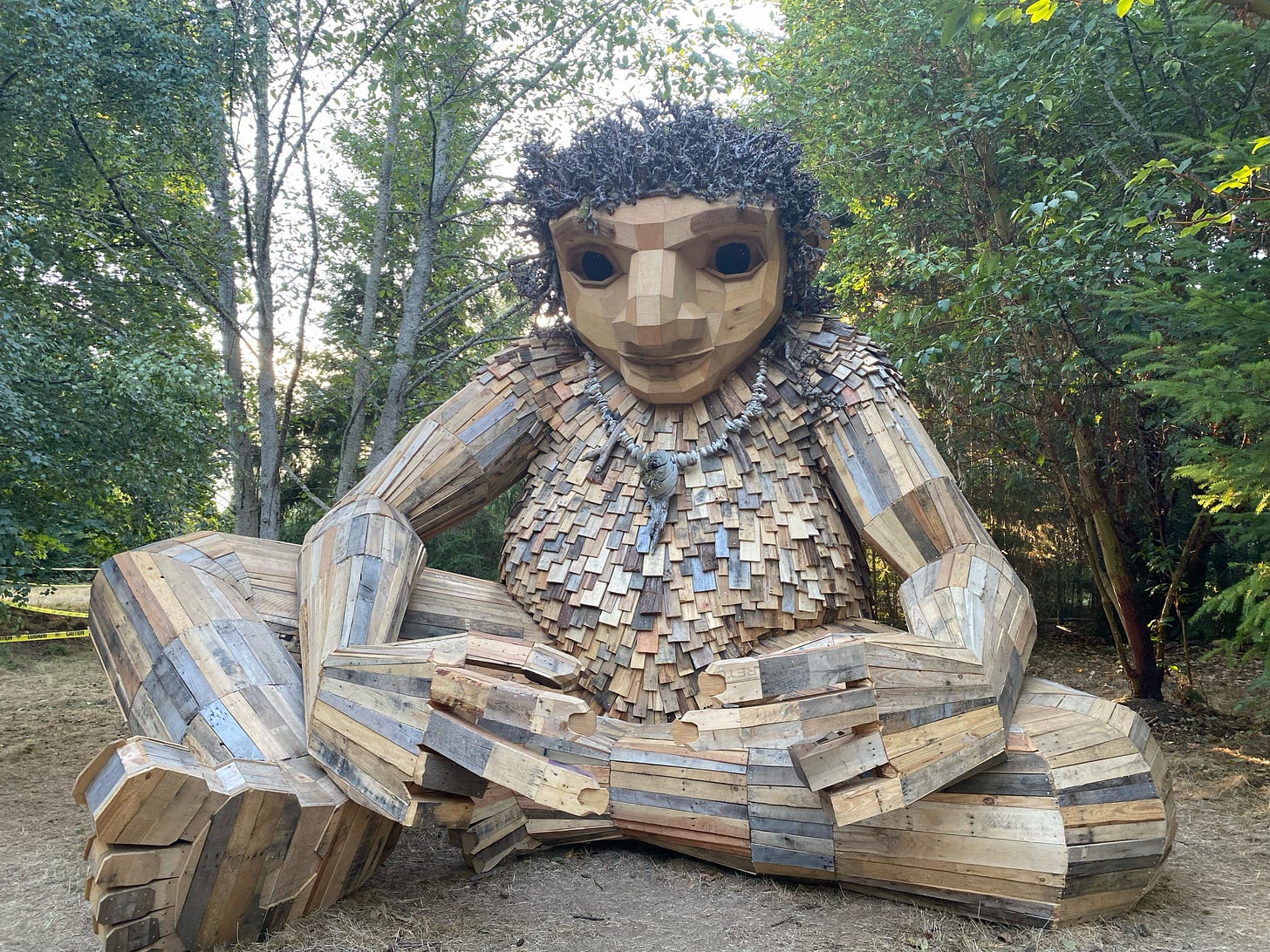 Pia the Peacekeeper is an 18 foot tall, wooden sculpture of a troll in Sakai Park on Bainbridge Island in Washington State.