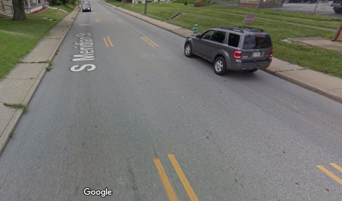Google Street View image of a road with no potholes in it. Google Street View image of a road with no potholes in it.