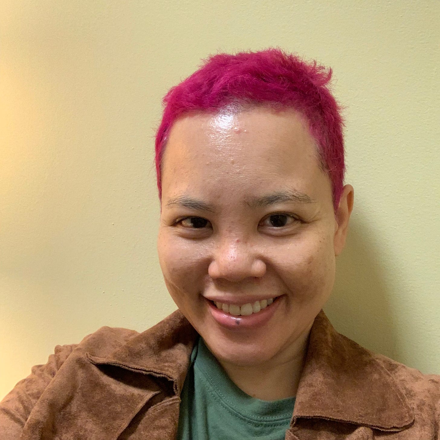 Selfie with short, pink hair