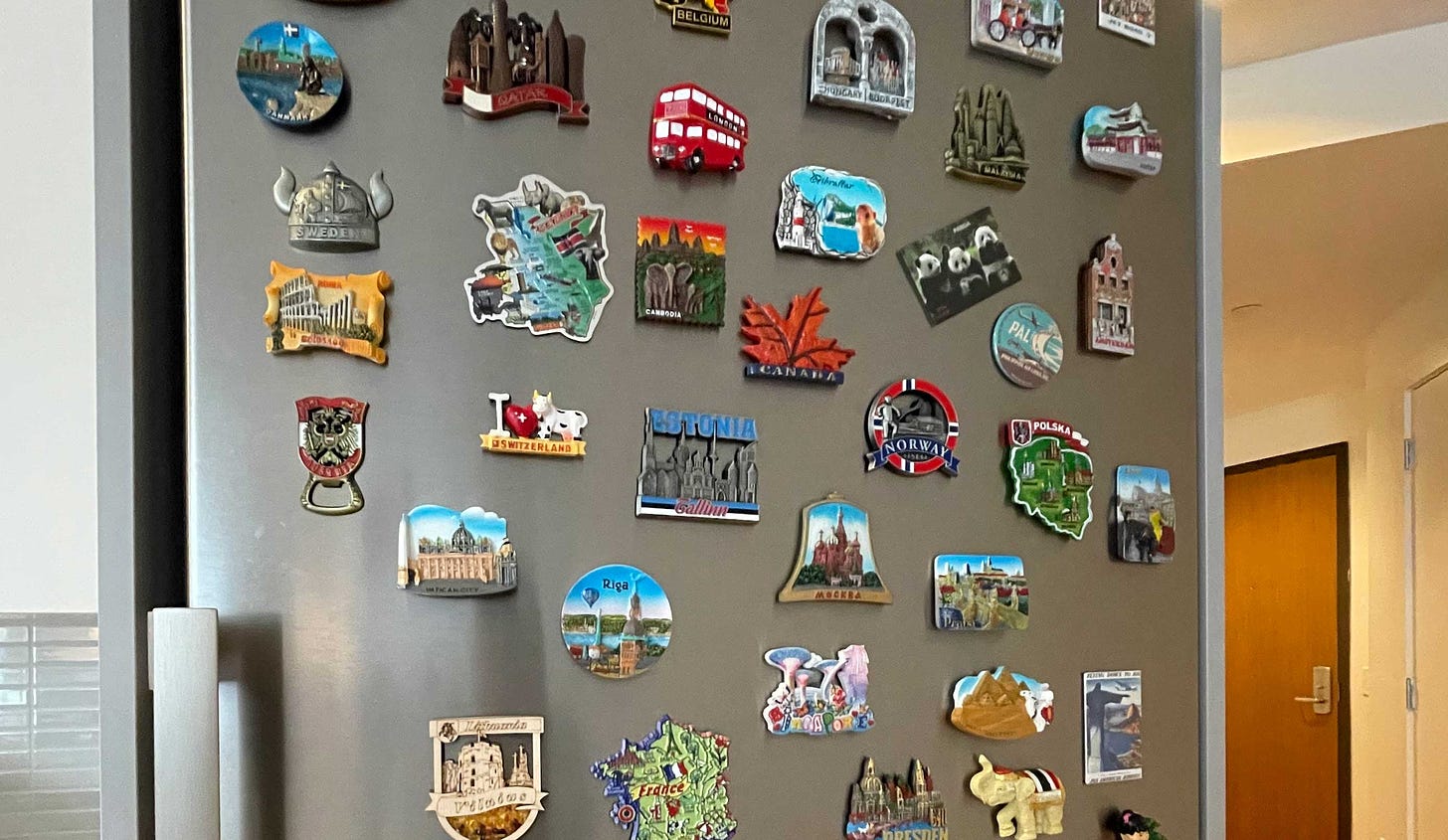 Magnets on a stainless steel refrigerator.