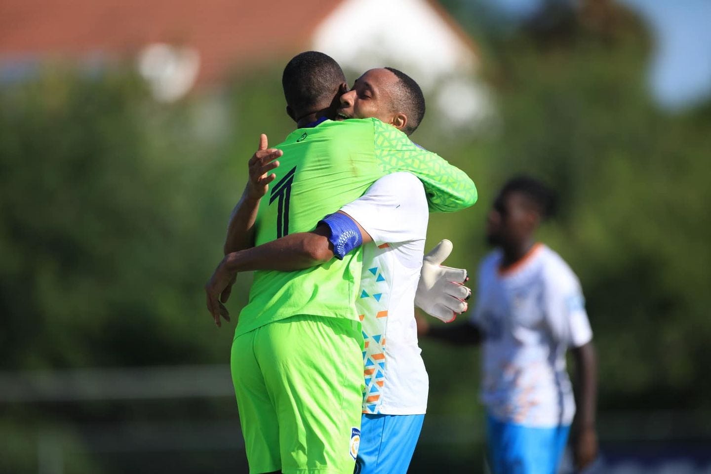 May be an image of 2 people, people playing football and people playing soccer