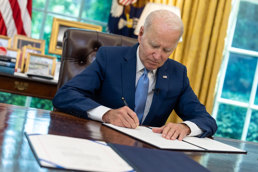 President Joe Biden signs a veto for H.J. Res. 45, a resolution that would disapprove of the Department of Education's rule relating to “Waivers and Modifications of Federal Student Loans”, Wednesday, June 7, 2023, in the Oval Office. The bill bill would have repealed his plan to forgive student debt. (Official White House Photo by Adam Schultz)