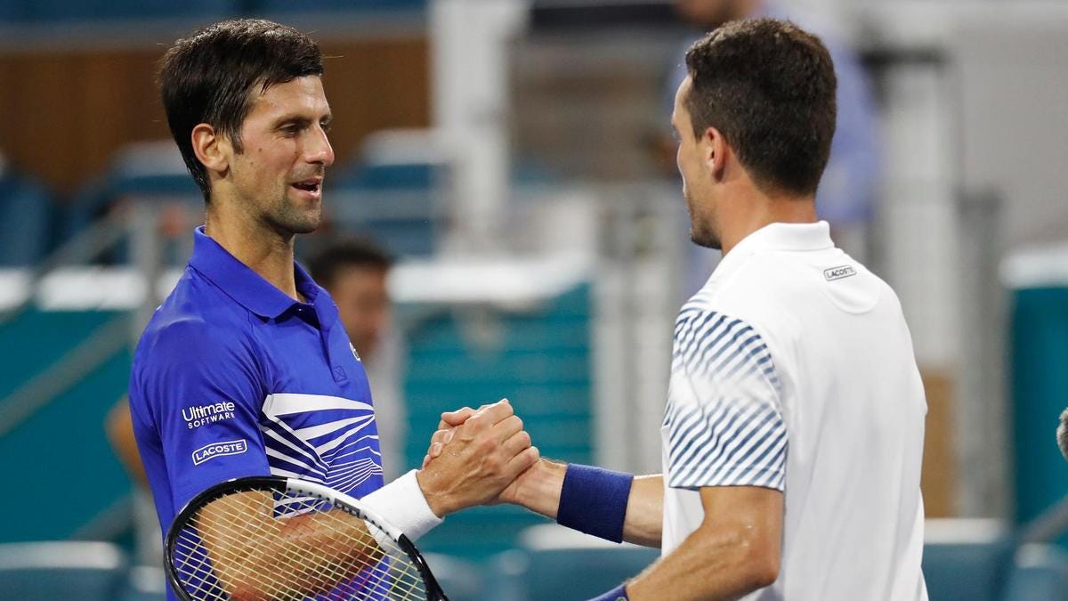 novak djokovic vs roberto bautista agut at wimbledon 2019