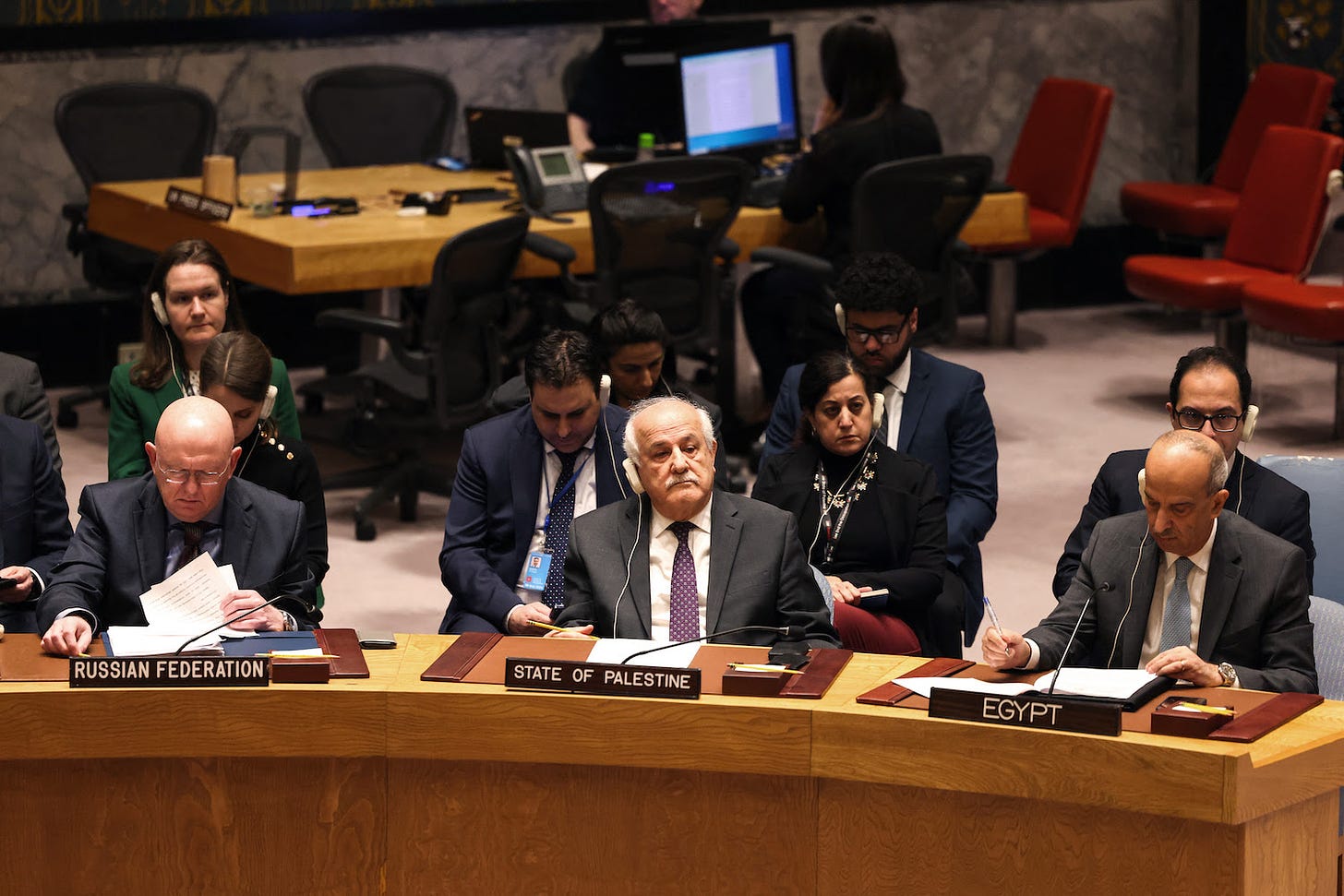 The Russian, Palestinian, and Egyptian representatives to the United Nations attend a Security Council meeting.