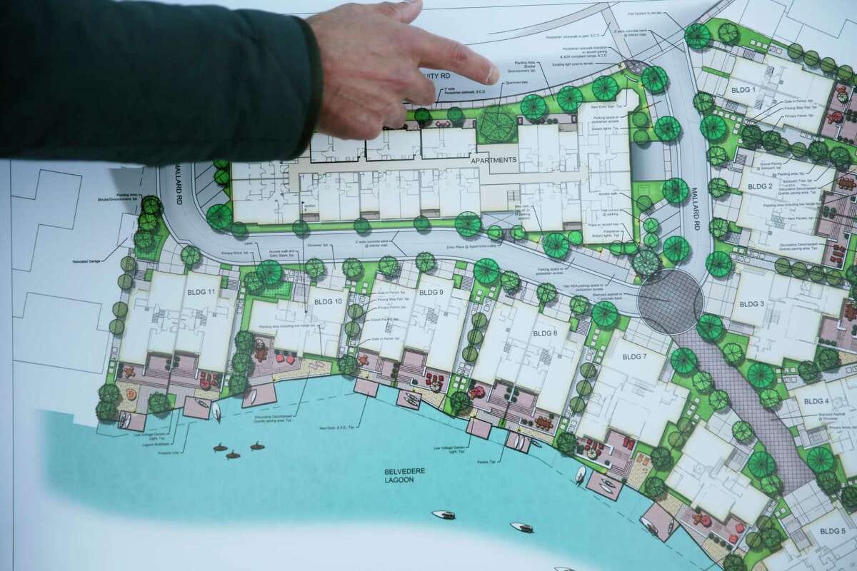Developer Bruce Dorfman, in 2022, shows plans for a new residential development proposed for the existing Mallard Pointe neighborhood in Belvedere.