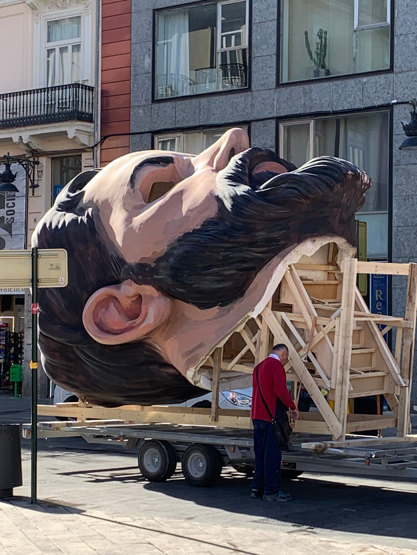 A giant head with stairs in the back and holes for people to look out of instead of eyes