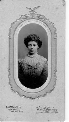 A photographic portrait of a young woman in Edwardian dress.