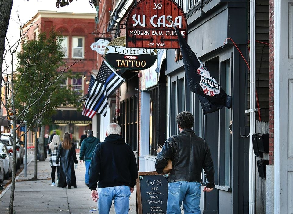 People walked in downtown Plymouth on Nov. 3.