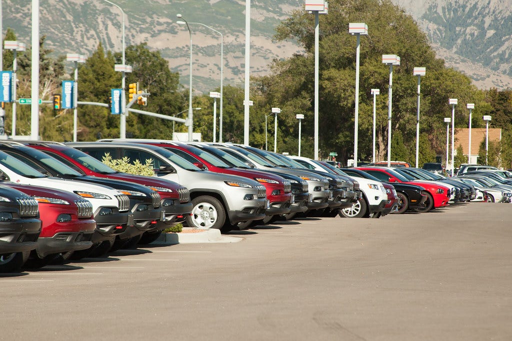 Photo of cars lined up at a dealership