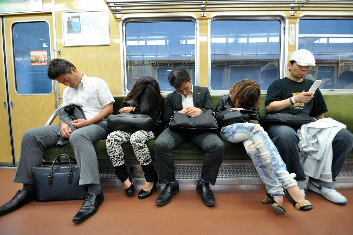 Why do Japanese people sleep on trains?