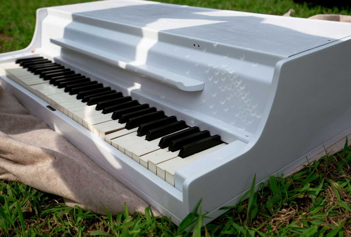The refinished white 140b with the original key color.