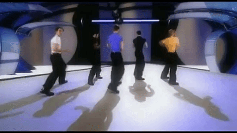 NSYNC dancing in their tight tees and baggy black pants