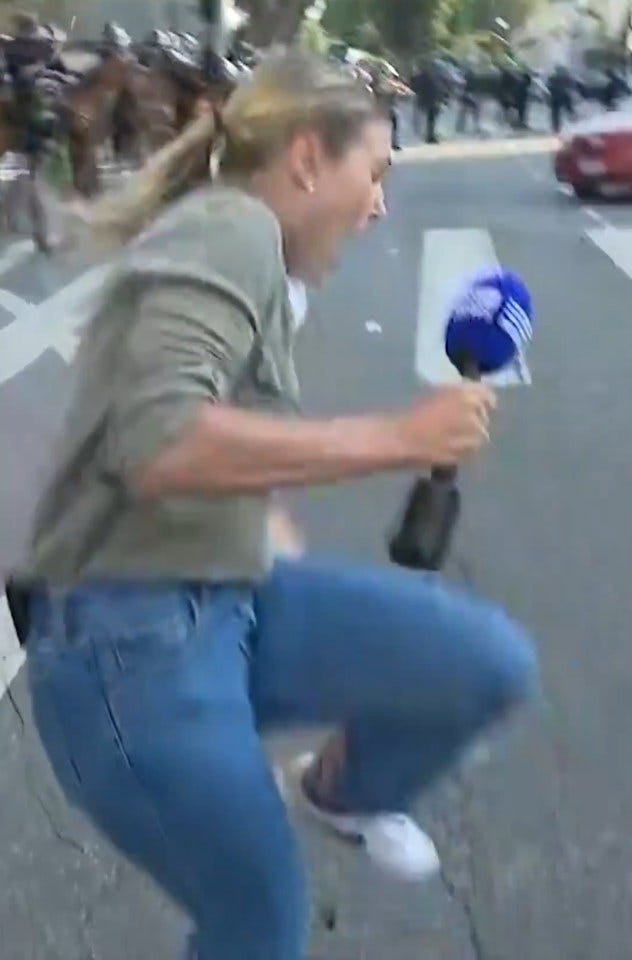 Reporter hit by rubber bullet during protest.