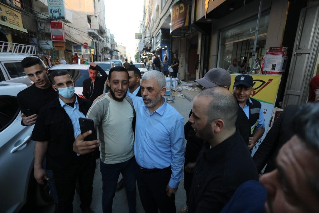 Yahya Sinwar with supporters as he tours the al-Rimal neighbourhood in Gaza City, May 26, 2021. (Photo: Ashraf Amra/APA Images)