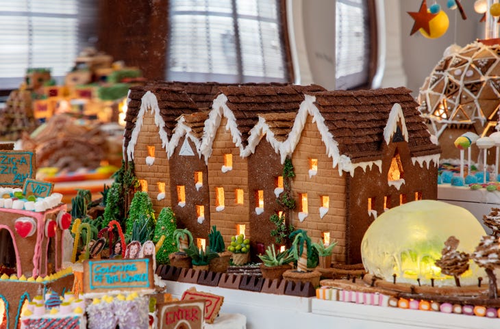 A  row of mini houses made from gingerbread and decorated with icing