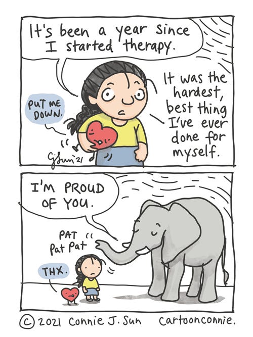Therapy Update Two-panel comic showing a cartoon girl with a braid, holding a ball-sized heart in her arms, talking about starting therapy a year ago. Heart tells her to "put me down." In the second panel, Elephant pats girl on the head and says, "I'm proud of you." Girl and Heart stand side by side and Heart responds, "Thx." Mental health awareness comic by Connie Sun, cartoonconnie