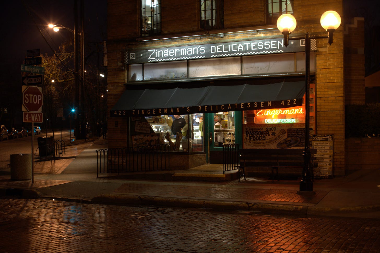 A photo of the Zingerman's Deli storefront at night in March 2009