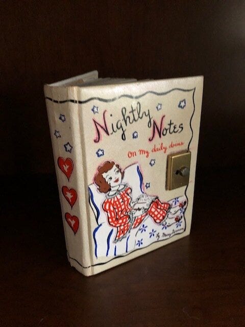 Beige journal with cover art of a girl in bed writing and words that read: "Nightly Notes on my Daily Doin's" Beige journal with cover art of a girl in bed writing and words that read: "Nightly Notes on my Daily Doin's"