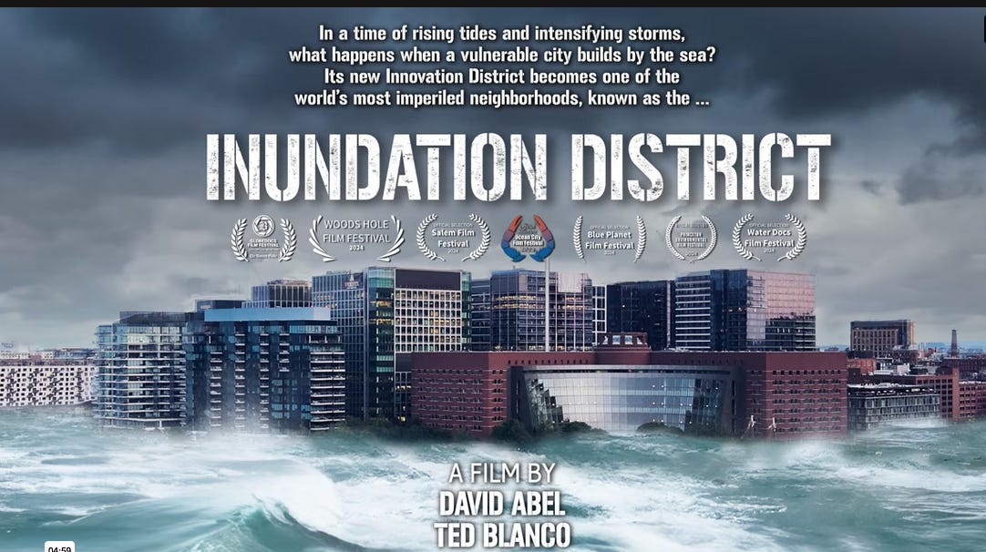 Screenshot from the website for the documentary film Inudation district. Image is of tall gleaming buildings of Boston's seaport district, with a rising, angry sea in the foreground.