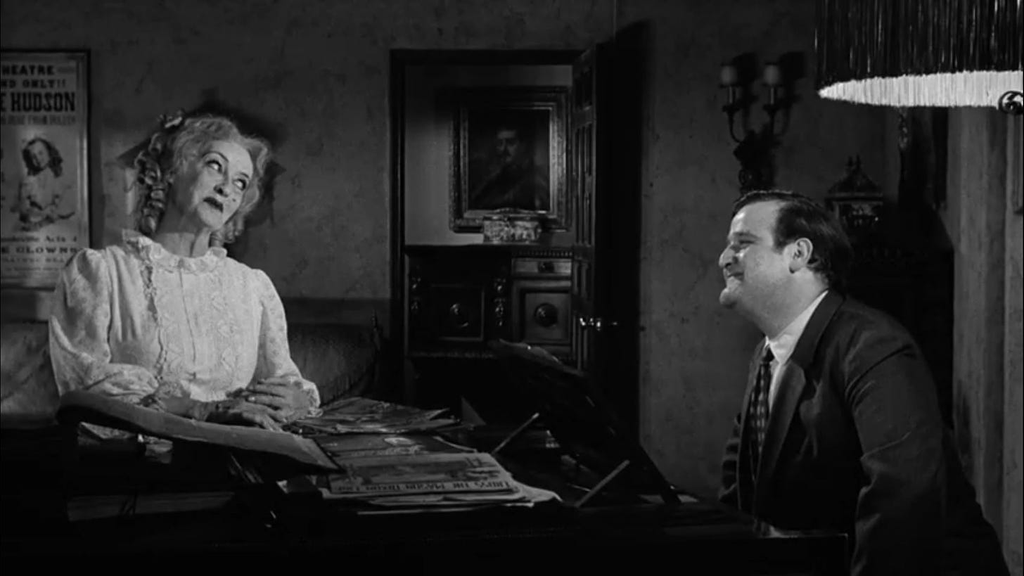 A very young Victor Buono in his first scene with a flirtatious and unhinged Bette Davis.