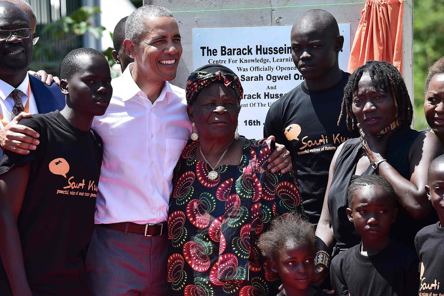 This photo, taken in July 2018, shows Barack Obama, his step-grandmother Sarah, and his half-sister Auma, along with four children and two other adults, at the dedication ceremony of the Barack Hussein Obama Sr. Centre for Knowledge, Learning, and Excellence located in Nyang'oma Kogelo, Kenya. This photo, taken in July 2018, shows Barack Obama, his step-grandmother Sarah, and his half-sister Auma, along with four children and two other adults, at the dedication ceremony of the Barack Hussein Obama Sr. Centre for Knowledge, Learning, and Excellence located in Nyang'oma Kogelo, Kenya.