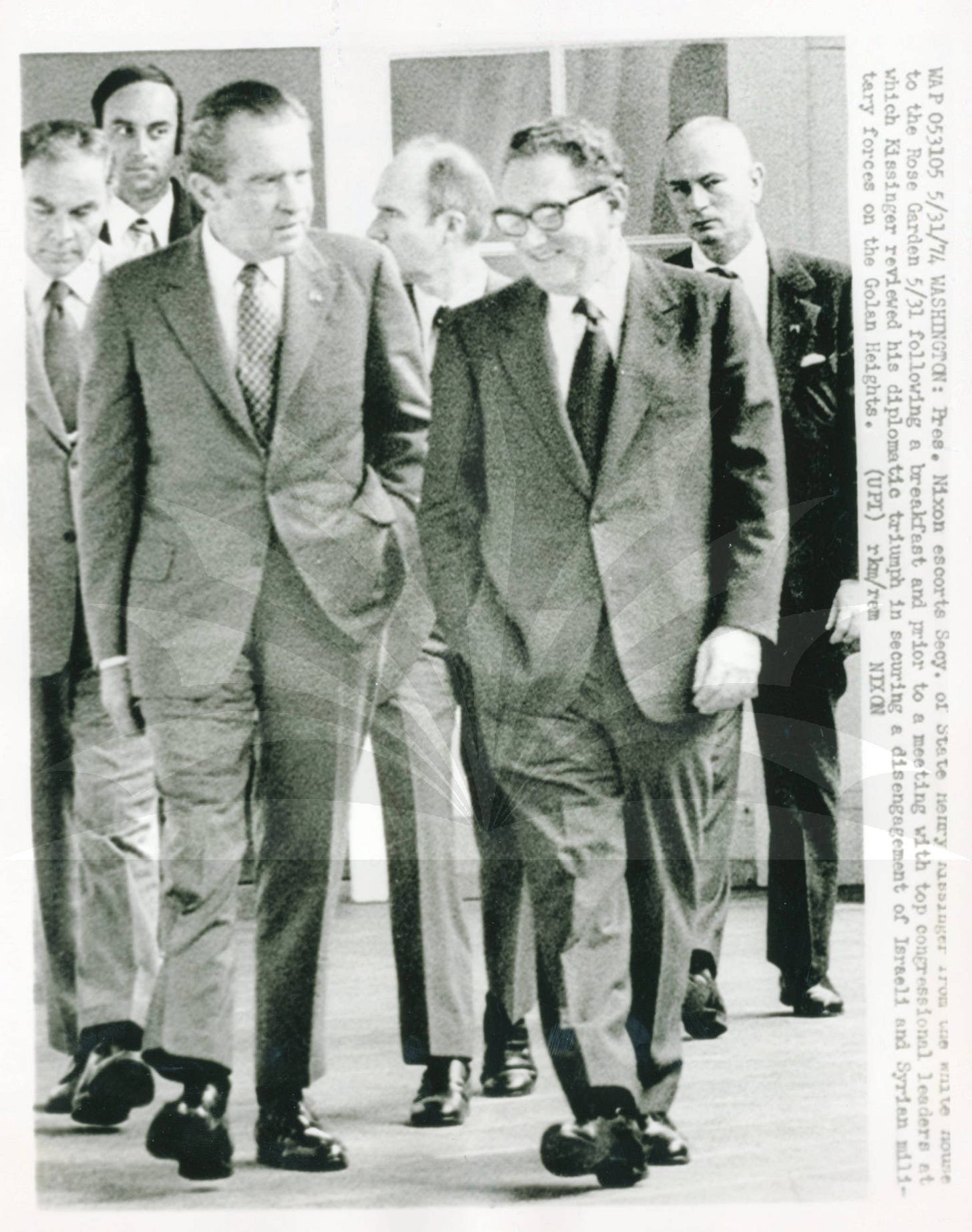 Henry Kissinger and President Nixon Walking" Henry Kissinger and President Nixon Walking"