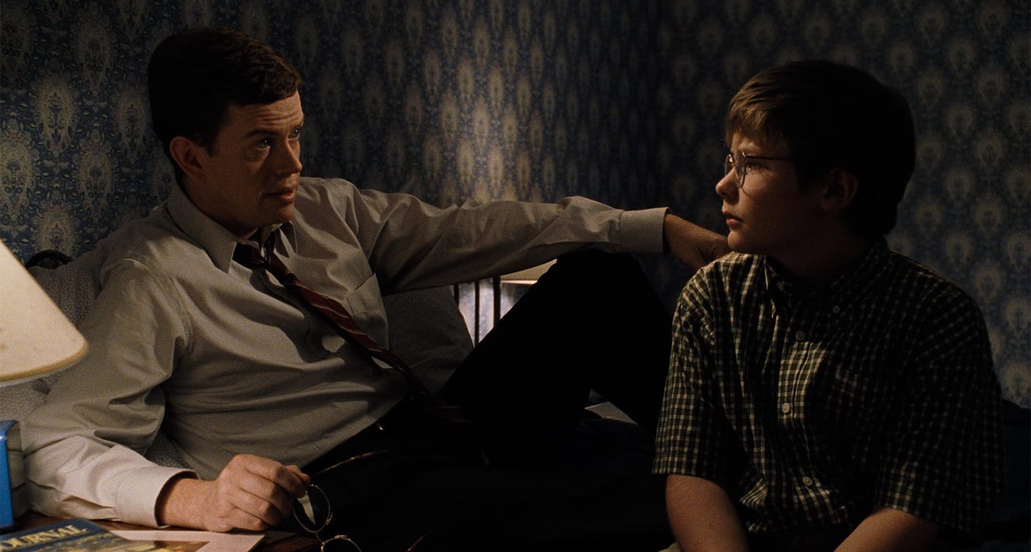 Happiness | Still features Dylan Baker as Bill Maplewood having a heart-to-heart conversation with his son Billy, portrayed by Rufus Read.