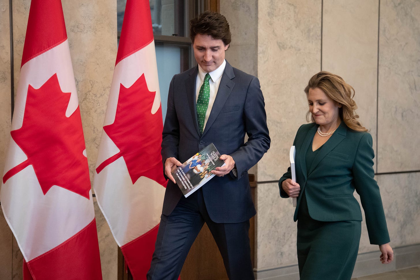 Justin Trudeau and Chrystia Freeland hold copies of the federal budget in Ottawa on Tuesday.