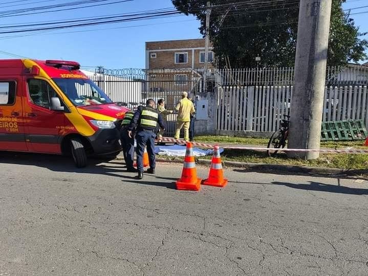 May be an image of 4 people, ambulance and text